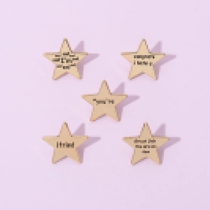 Set of five wooden star pins with humorous English phrases on a soft purple background