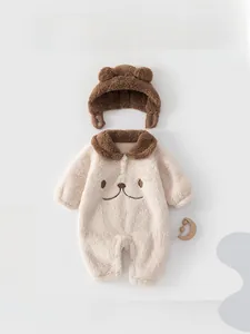 Close-up of thick bear-themed baby winter romper with plush ears hat and soft texture