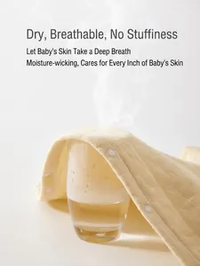 Breathable quilted cotton baby romper showing steam rising to demonstrate ventilation