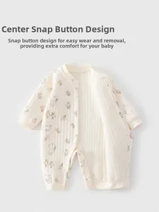 Detail of newborn baby romper featuring full snap buttons and cute tulip rabbit print