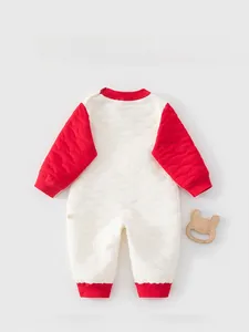 Detailed back view of white quilted baby romper with red ribbed cuffs for autumn and winter
