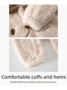 Detail of baby romper cuffs showing durable double-stitched seams and soft plush fabric