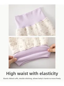 Detail of high waist baby thermal pants with purple elastic band and floral quilting
