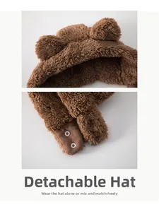Detail view of the detachable plush baby hood with cute 3D bear ears and secure snap buttons