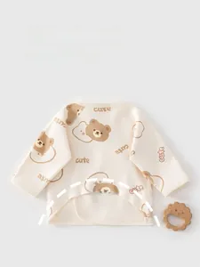 Detailed view of long sleeve baby wrap top featuring cute bear print and half-back design