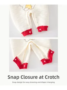 Close-up of baby romper snap closure and quilted fabric for easy diaper changes