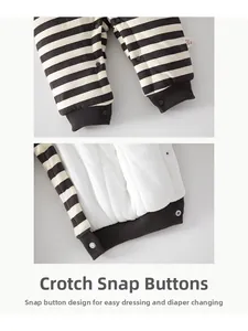 Detail view of crotch snap buttons on striped baby cotton romper for easy diaper changes