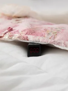 Pink cherry blossom baby textile with gold details and tassel, fluorophore-free A-standard