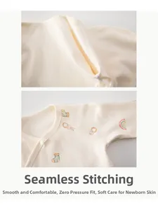Detail of flat seam stitching and rabbit prints on cotton newborn kimono top