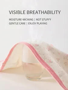 Breathable cotton baby vest with pink floral pattern showing steam ventilation effect