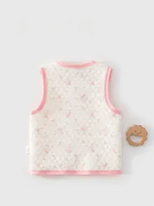 Detailed back view of baby quilted vest with pink floral pattern and honeycomb texture