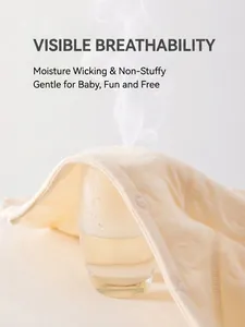 Breathable cream quilted thermal baby romper showing steam test for moisture wicking