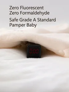 Thick beige baby romper showing non-fluorescent and zero formaldehyde safety test results