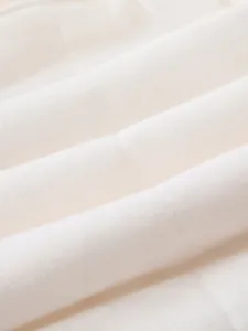 Close-up of soft breathable fine spinning cotton fabric for newborn winter jumpsuits