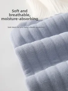 Close-up of soft cotton baby pants fabric with moisture-wicking and breathable texture