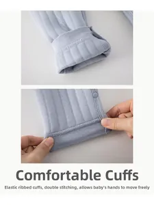 Detail of baby pants light blue ribbed cuff with snaps and high-quality flat seams