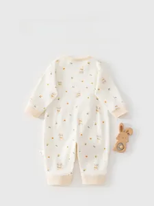 Detailed back view of a baby cotton bodysuit featuring cute yellow bear and floral patterns