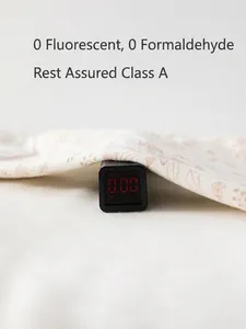 Barboteuse bébé en coton avec imprimé feuilles et test sans agent fluorescent