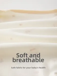 Close-up of soft breathable cotton fabric with bear patterns for baby onesie