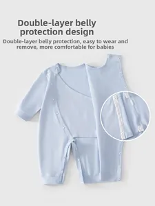 Detail of baby cotton romper featuring double-layer tummy protection and side snaps