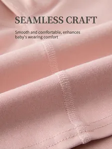 Pink baby cotton pajamas set featuring smooth seamless sewing craft for infant comfort