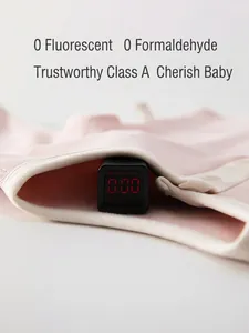 Pink infant high-waist thermal set showing 0.00 fluorescence safety test result