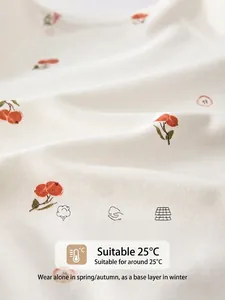White cotton baby bodysuit with cherry print made of premium soft Xinjiang cotton fabric