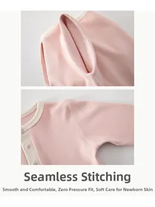 Macro detail of seamless stitching and soft knit fabric on pink baby loungewear