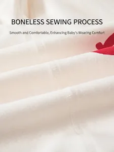 Infant cotton bodysuit with boneless seams for comfort in soft off-white and red