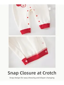 Detail of snap button crotch on cotton baby romper for easy diaper changes
