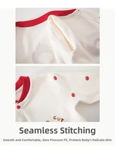 Detail of baby cotton bodysuit featuring seamless sewing and red ribbed neckline design