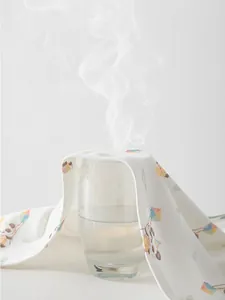 Breathable pure cotton baby undershirt set showing steam passing through for ventilation