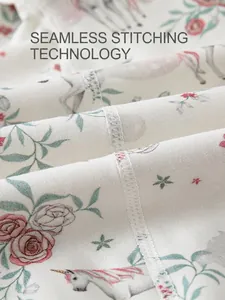 Cotton baby bodysuit with unicorn floral print and seamless flatlock stitching details