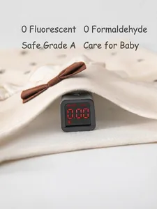 Ensemble bébé en coton beige testé pour la sécurité sans agent fluorescent