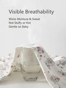 Breathable baby cotton romper with floral and animal prints showing steam permeability