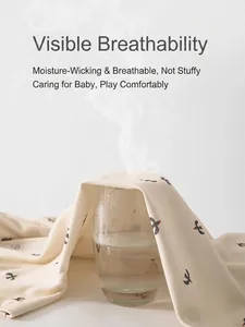 Breathable pure cotton baby romper with bird print showing steam ventilation quality