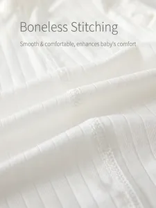 White ribbed cotton baby bodysuit with seamless stitching and ultra-soft fabric texture
