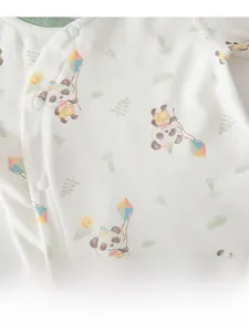 Close-up of pure cotton baby sleepwear set featuring cute panda and kite prints