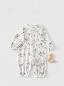 Detail view of cotton baby bodysuit with floral and unicorn print and back design