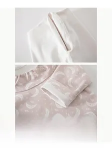 Detail of flat-seam construction and soft cotton moon print fabric for baby pajamas