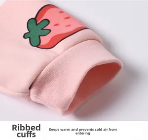 Detail of pink ribbed cuffs and strawberry print on thick baby winter bodysuit
