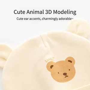 Creamy cotton newborn baby hat with 3D ears and sweet bear print for infants