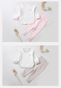 Detail view of cotton baby pajama sets with high waist pants and diagonal button tops