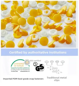 Close-up of food-grade POM plastic snap buttons for baby clothes with quality certification