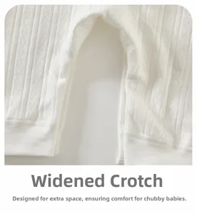 Close-up of baby bodysuit showing breathable cotton fabric and widened crotch detail