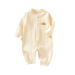 Grenouillère pour bébé en coton côtelé blanc crème avec manches longues et boutons-pression