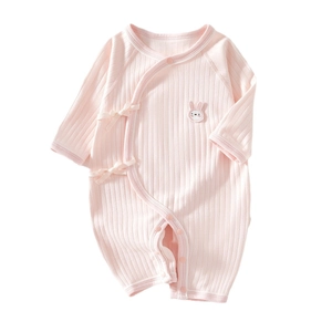 Newborn pink ribbed cotton romper with side-tie closure and bunny embroidery detail