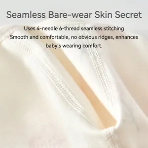 Detail of 4-needle 6-thread seamless stitching on soft cream cotton baby bodysuit