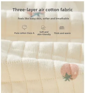Close-up of Class A pure cotton fabric with waffle texture and pink tomato prints