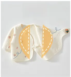 Detail of baby quilted cotton cardigan with double-layer belly protection and fruit print